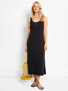 Black midi-length tank dress with three gold buttons.  Side slits.