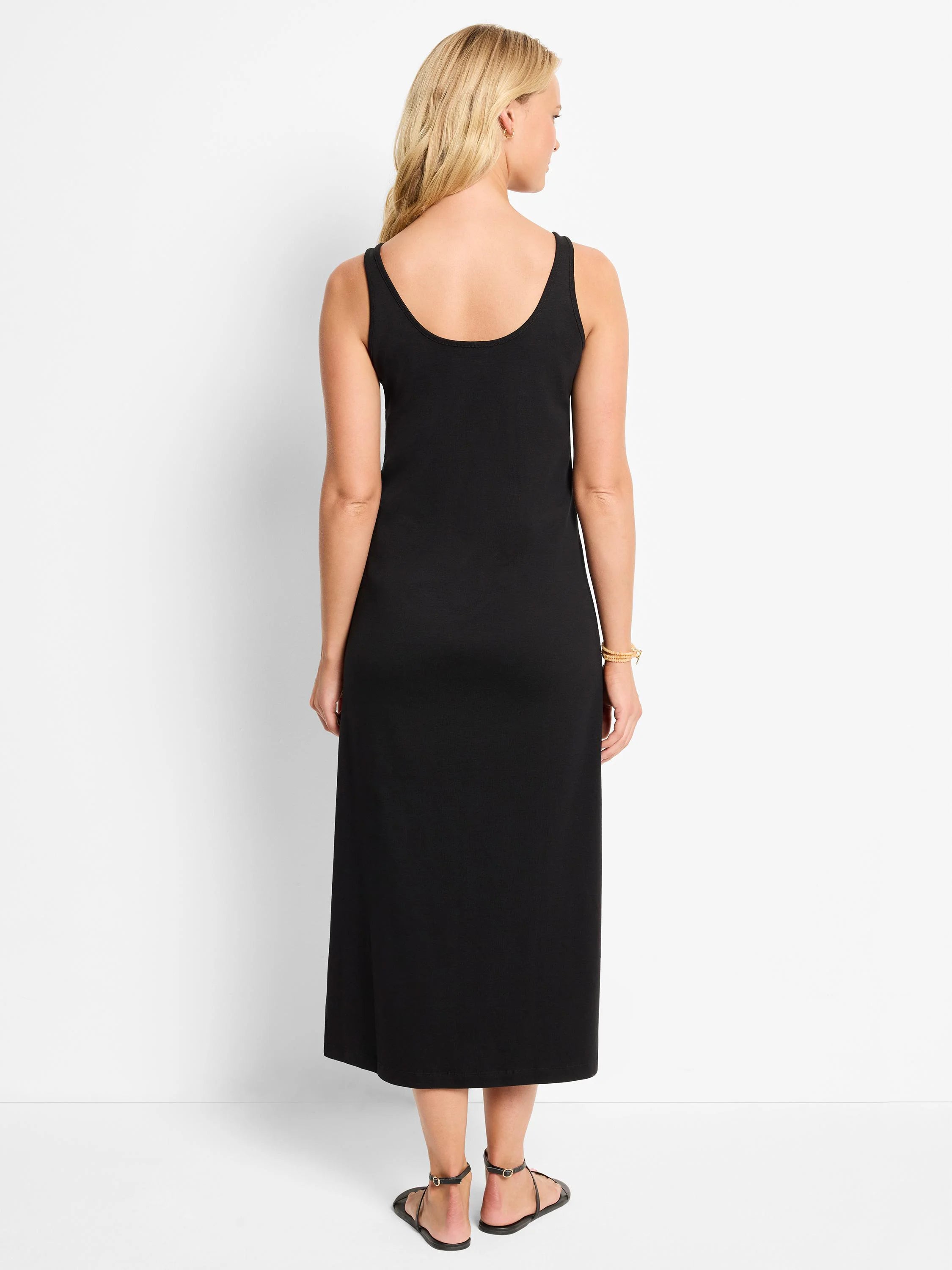 Black midi-length tank dress, sleeveless, straight cut.
