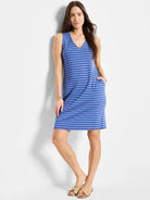 Blue and navy striped sleeveless V-neck dress, knee-length, with side pockets.