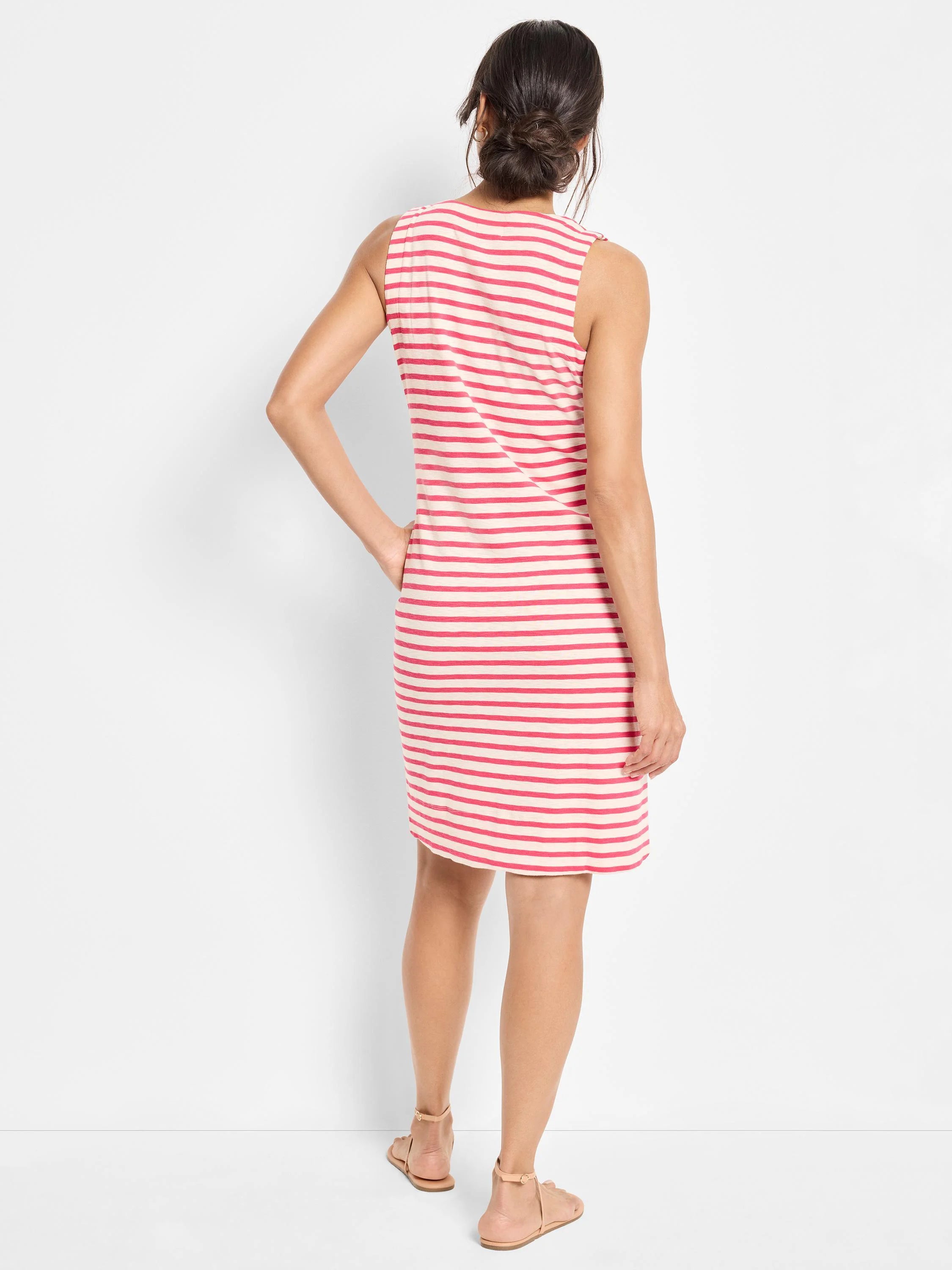 Pink sleeveless V-neck dress with horizontal red stripes.  Knee-length, casual style.