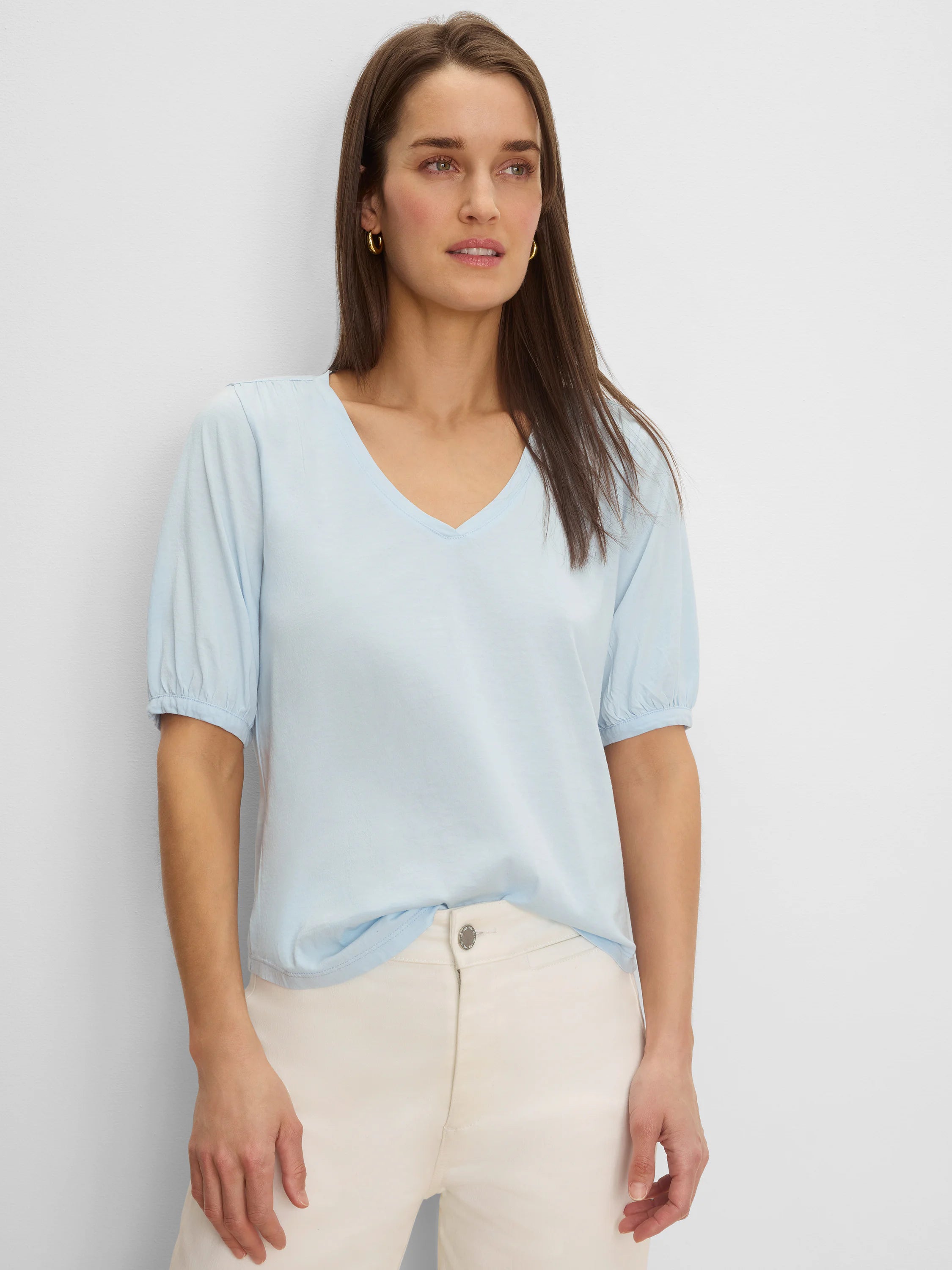 Light blue V-neck tee with elbow-length gathered sleeves.