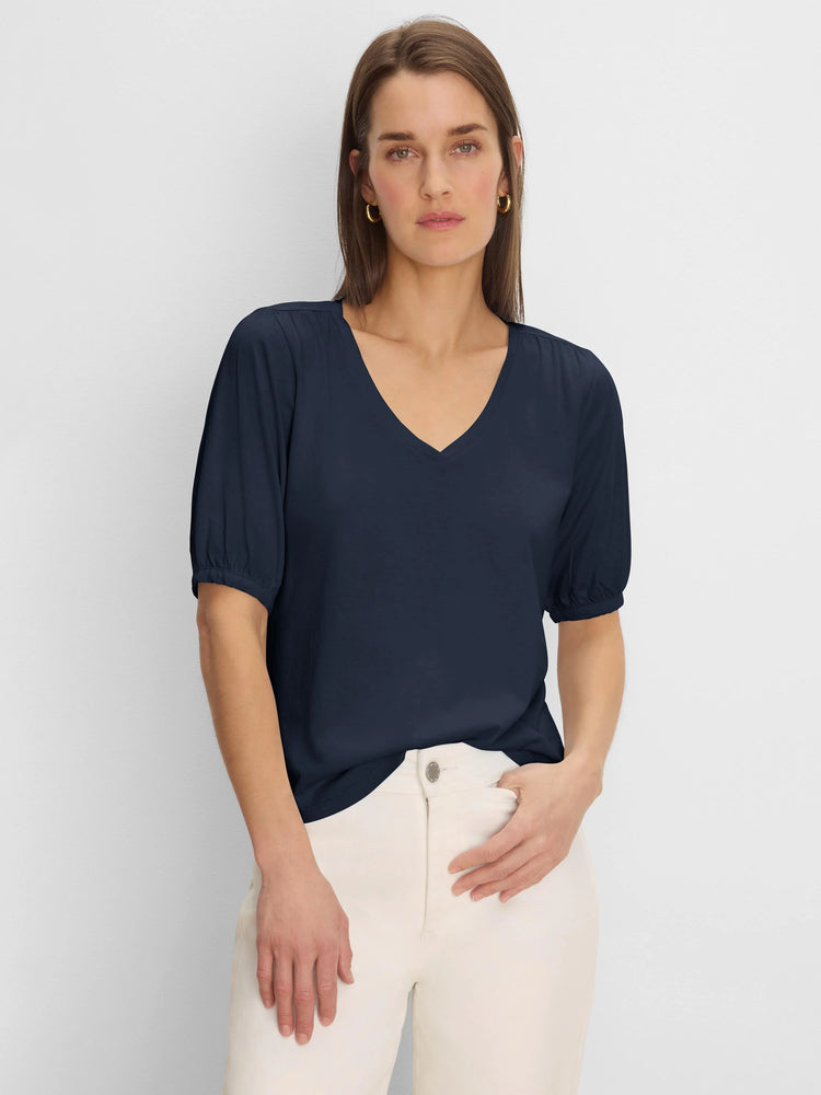 Navy V-neck tee with elbow-length sleeves, gathered at the shoulders.