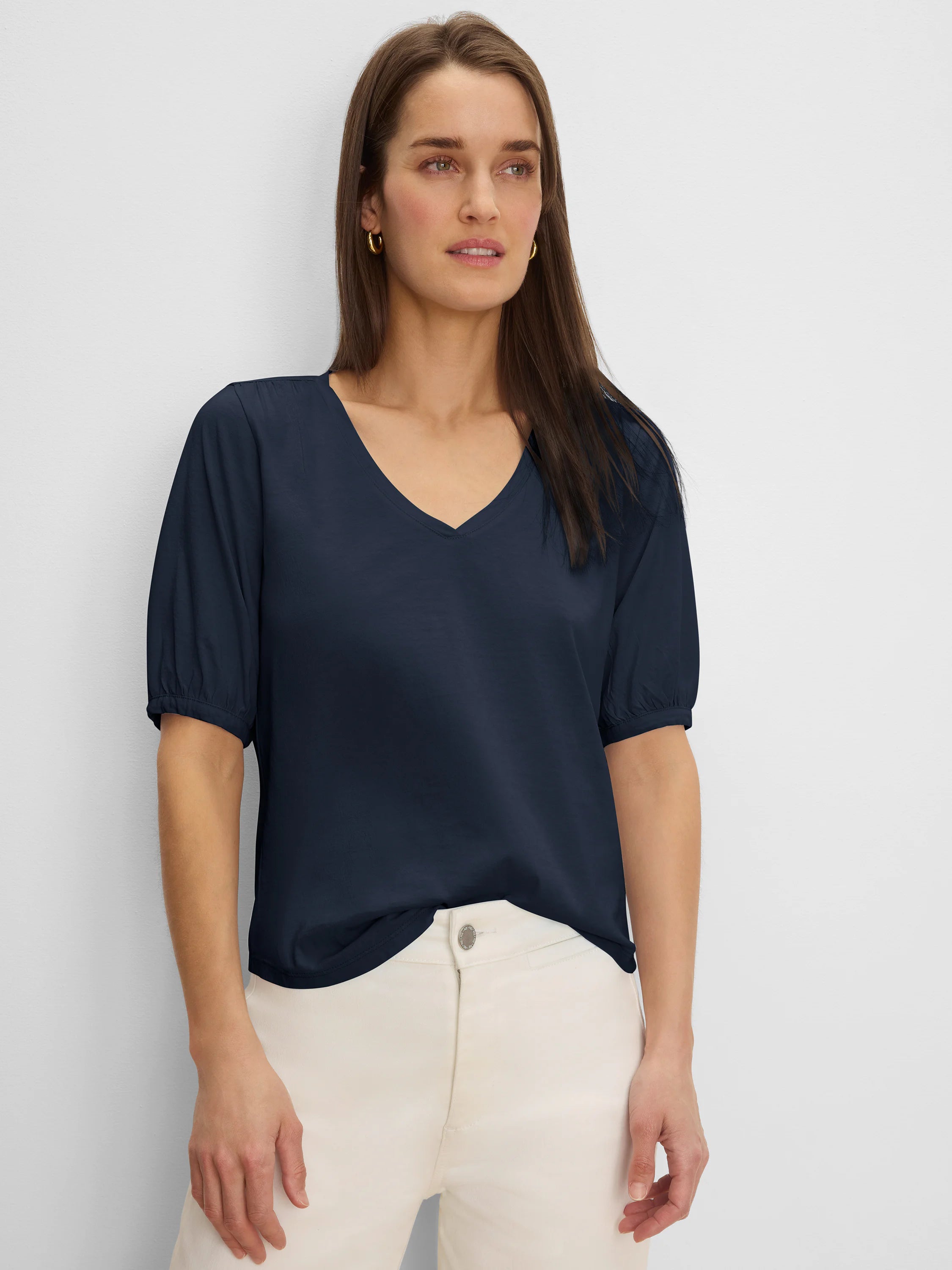 Navy V-neck elbow-sleeve tee with elasticated cuffs, shown on a model.