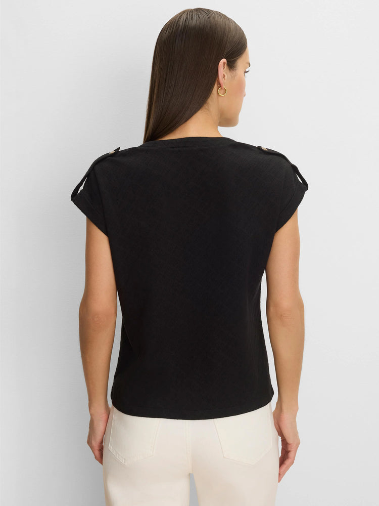 Black lace-knit cap sleeve tee with shoulder tabs and buttons, worn on model's back.