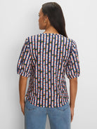 Navy, peach, light blue, green reef stripe V-neck tee with elbow-length sleeves.