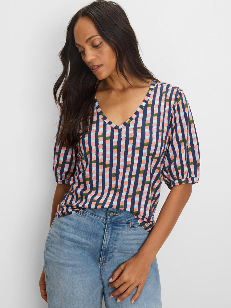 V-neck, elbow-sleeve tee with a multi-colored checkered pattern in navy, light blue, pink, and green.