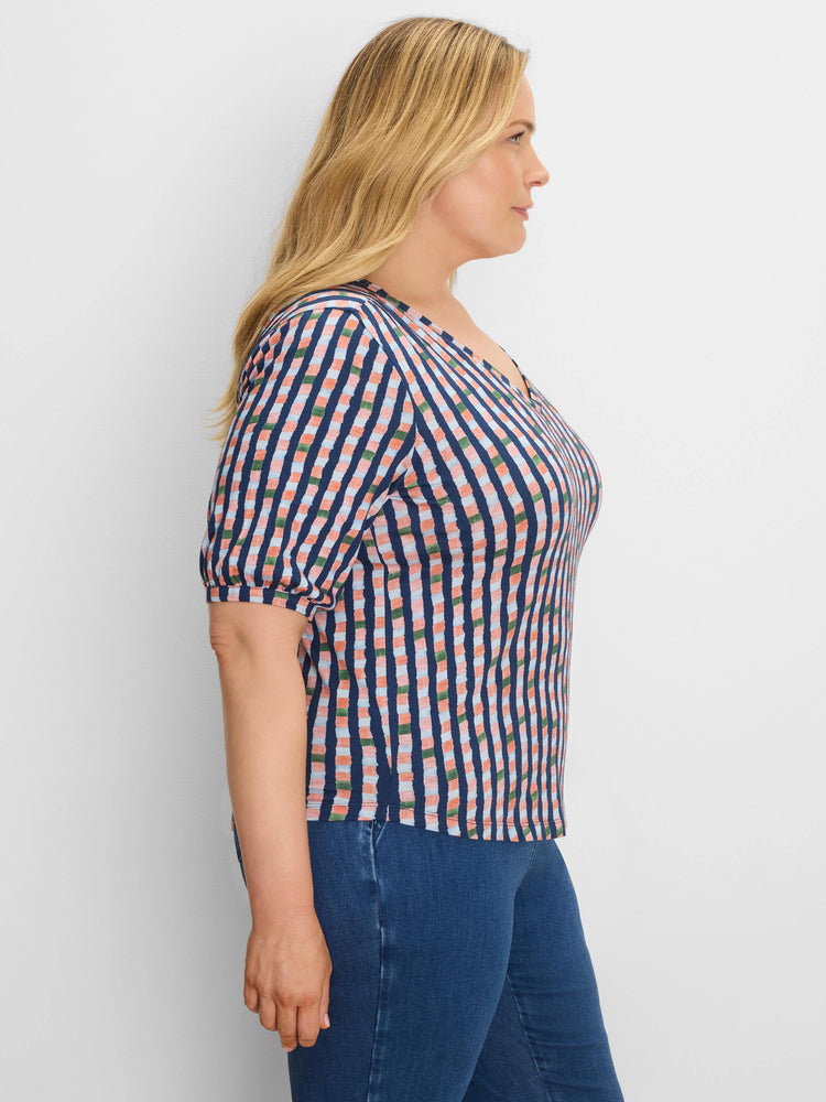 Elbow-length gathered sleeve V-neck tee. Dark blue, coral, light blue, and green plaid pattern.