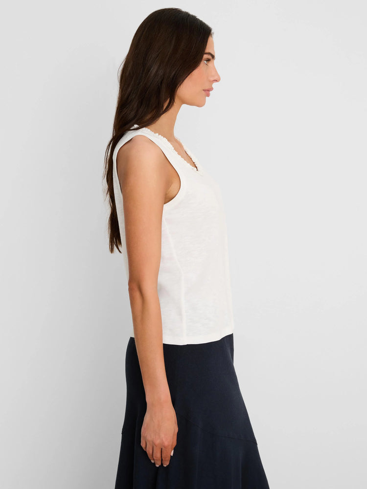 Off-white cotton slub tank top with a ruffle neck.