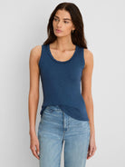 Deep blue slub cotton tank top with a ruffle-edged U-neckline.