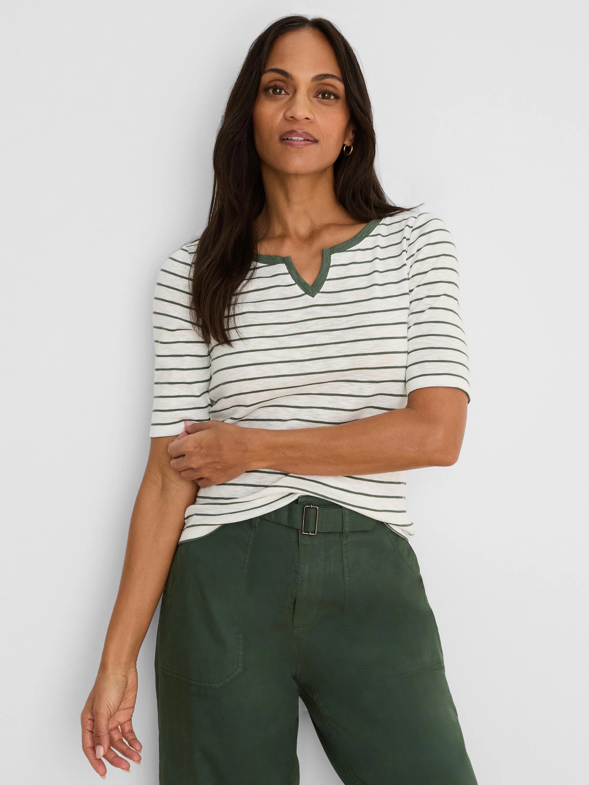 Cream tee with dark green horizontal stripes, elbow sleeves, and a V-notch neckline.