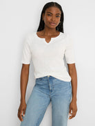 Cream, textured elbow-sleeve notch tee.
