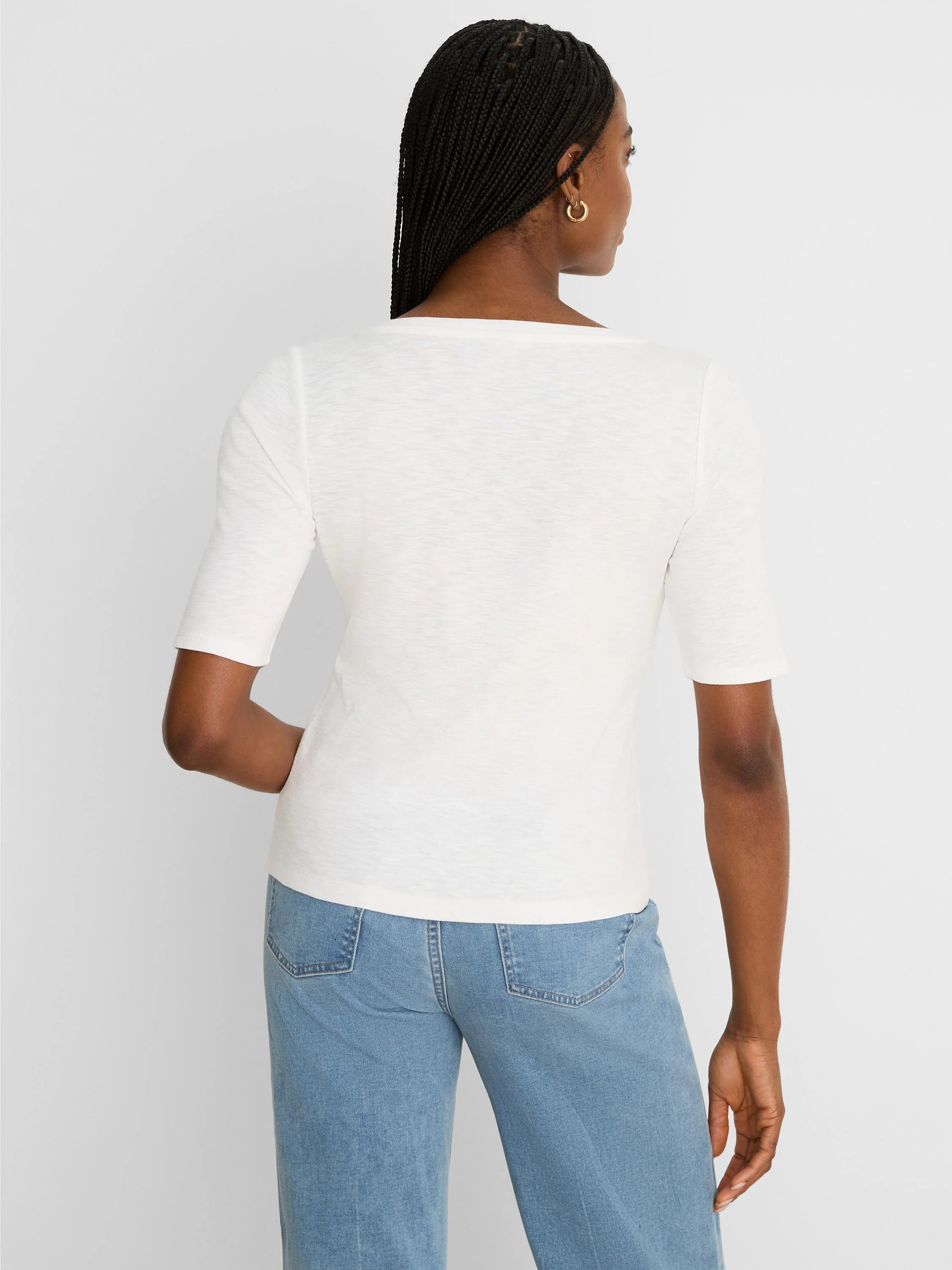 Off-white marled elbow-sleeve tee, fitted, with a wide back neckline. Model shown from behind.