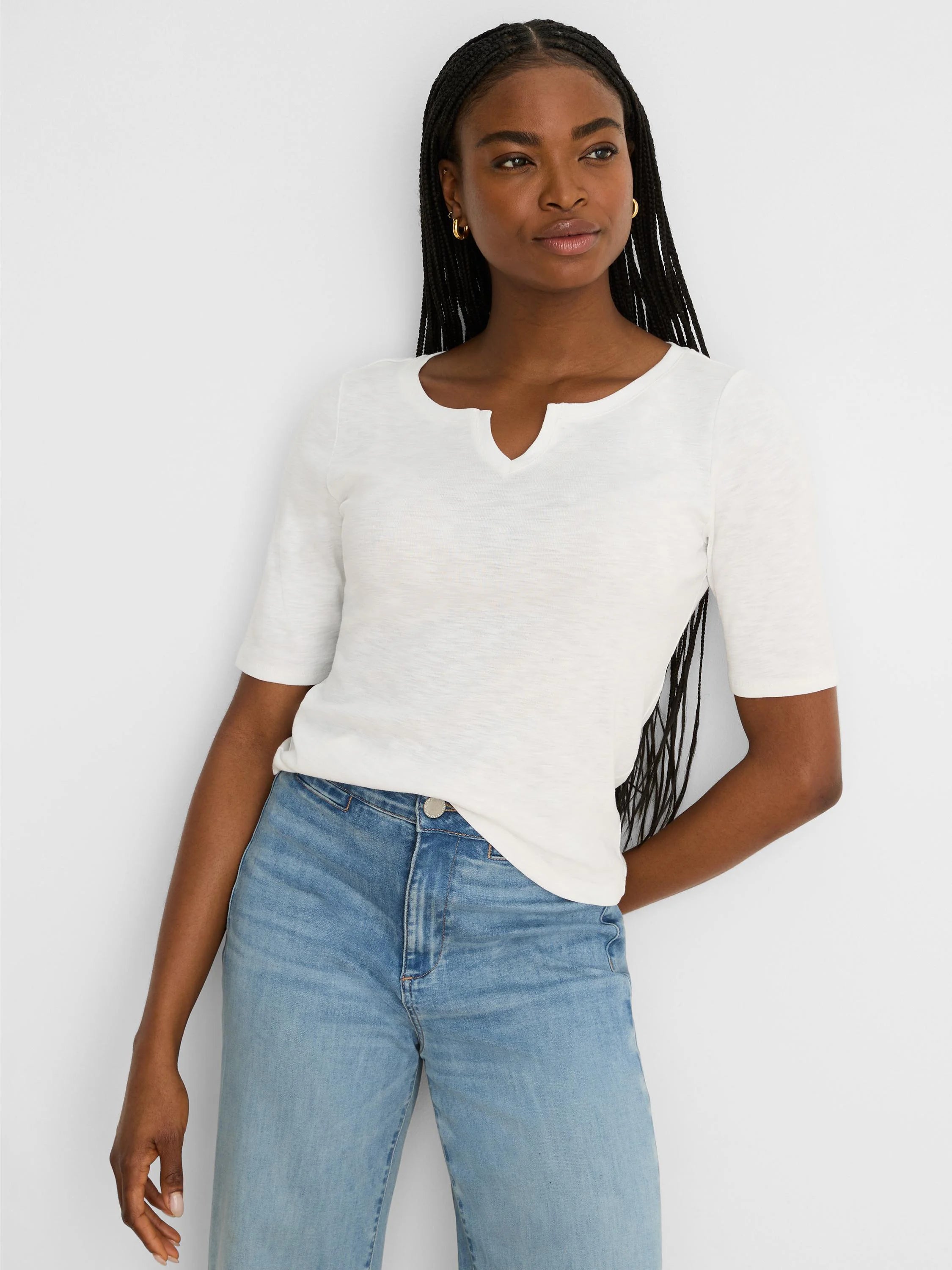 Cream elbow-sleeve tee with a notch neckline and subtle slub knit texture.
