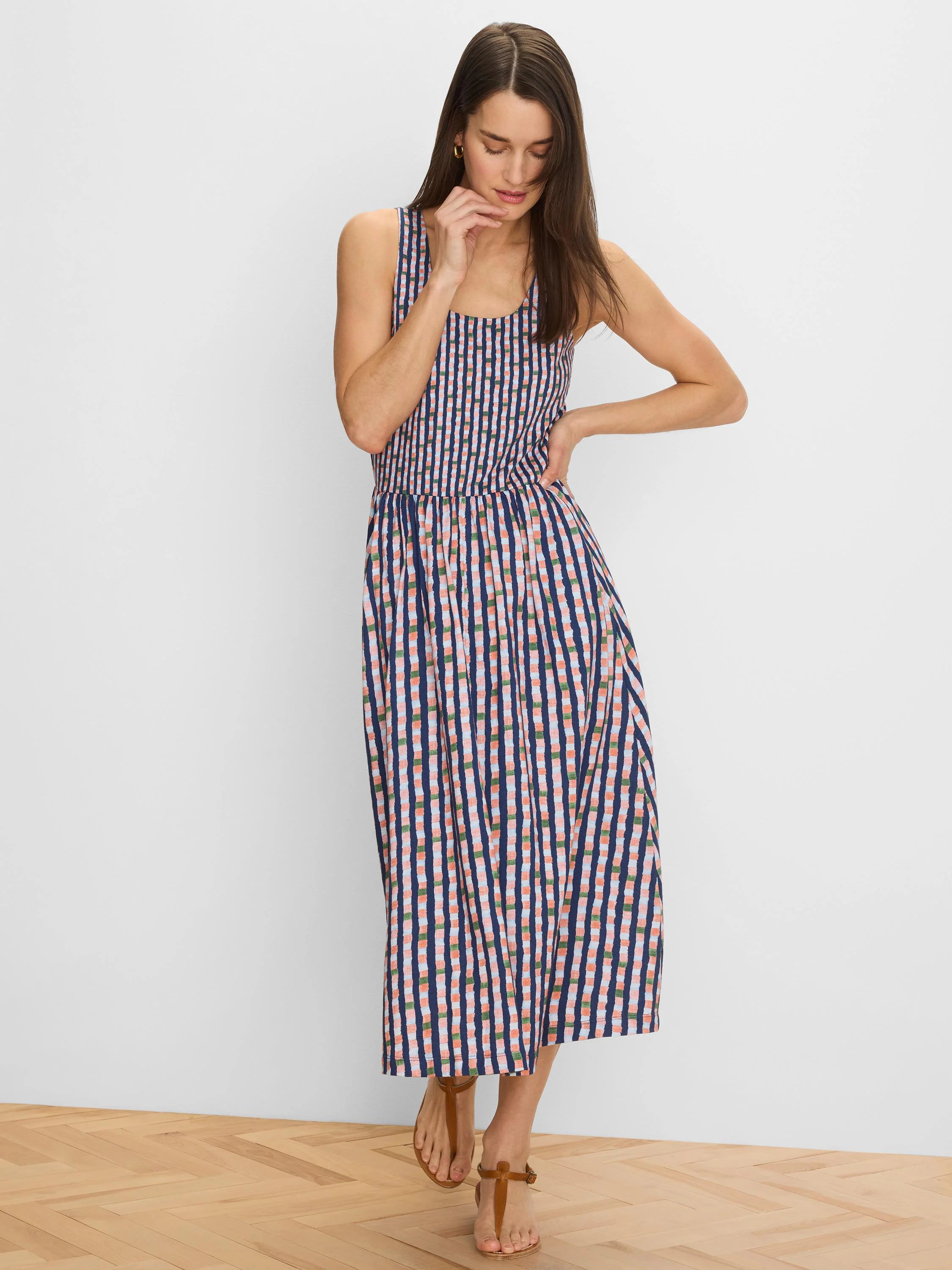 Knit midi dress: navy, light blue, coral, & green checkered pattern. Sleeveless tank top, fitted waist.