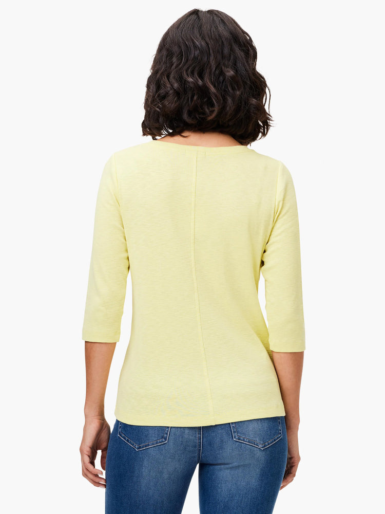 Pale yellow 3/4 sleeve boat tee, back view, with a center vertical seam and subtly textured fabric.