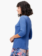 Blue heathered 3/4 sleeve boat neck tee.