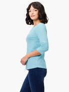 Light blue 3/4 sleeve boat neck tee with a subtle heathered knit texture.