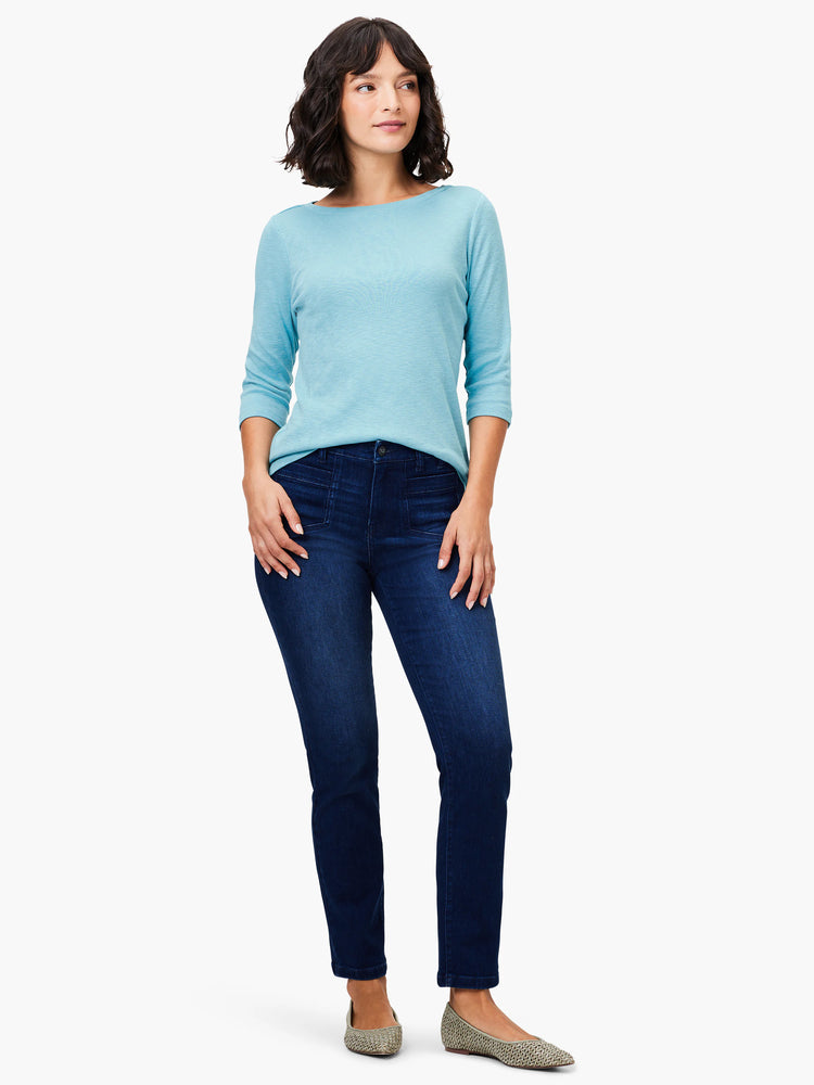 Turquoise 3/4 sleeve boat neck tee on model. Soft knit fabric, relaxed fit.