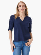 Navy blue, elbow-length ruched sleeves, split V-neck.