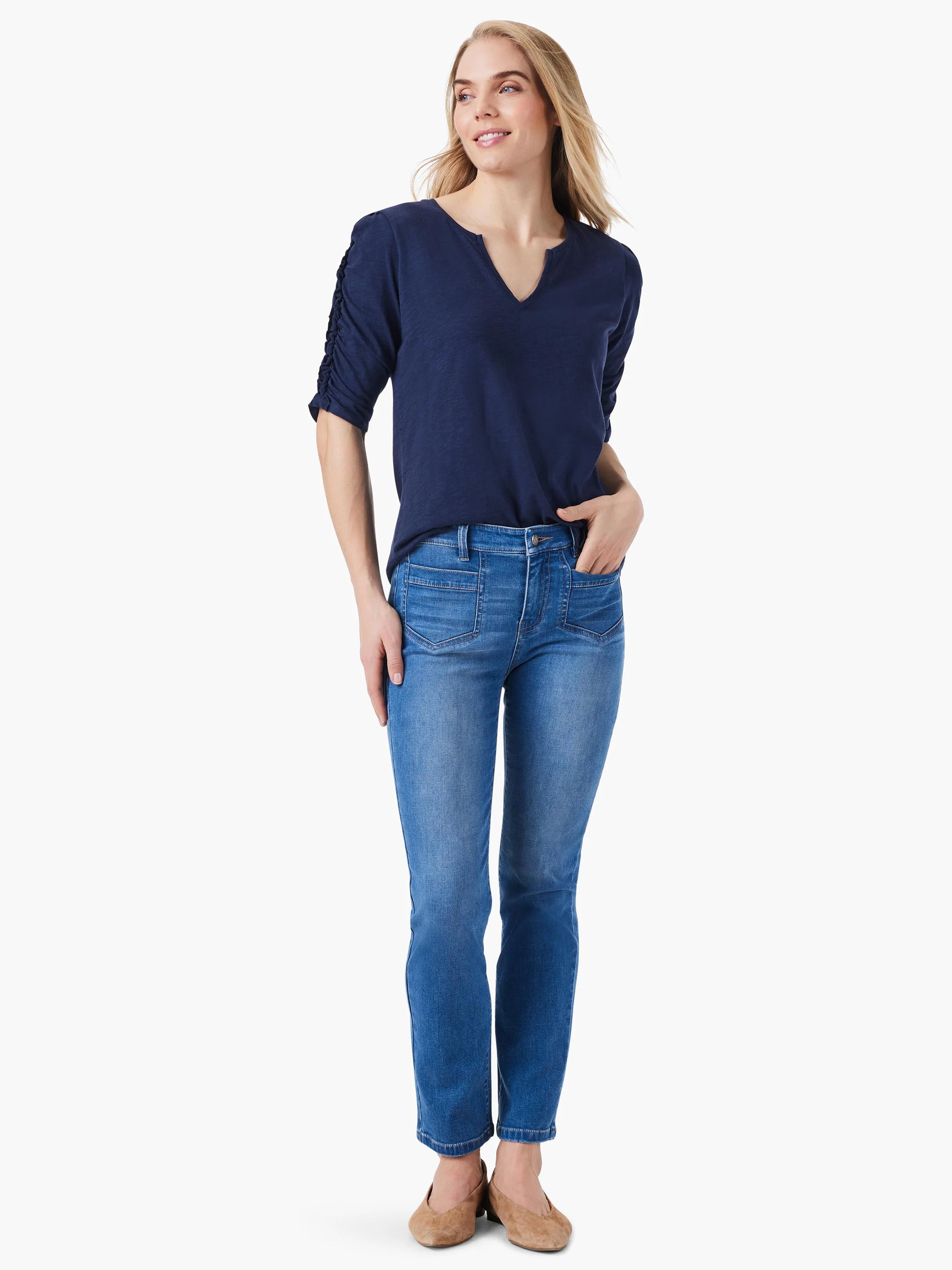 Navy blue, ruched elbow-sleeve top with a split neck.  Model also wears light wash jeans.