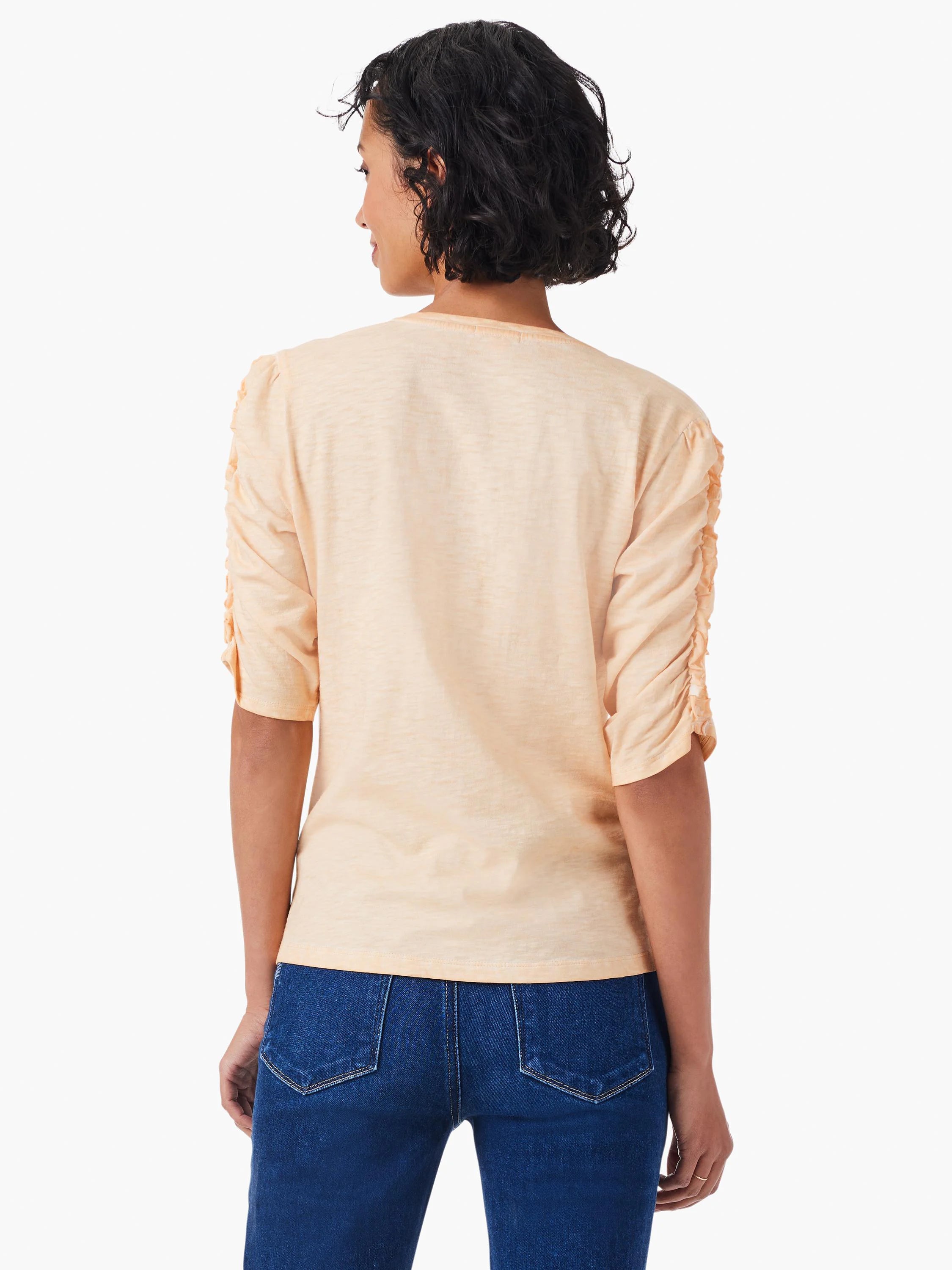 Peach-colored, short-sleeve top with ruched elbow-length sleeves and a split neckline.  Shown from the back.