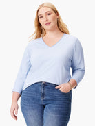 Light blue V-neck tee with 3/4 length sleeves and a relaxed fit.