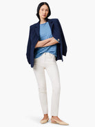 NZT 3/4 sleeve boat tee with light and medium blue horizontal stripes, worn by a model.