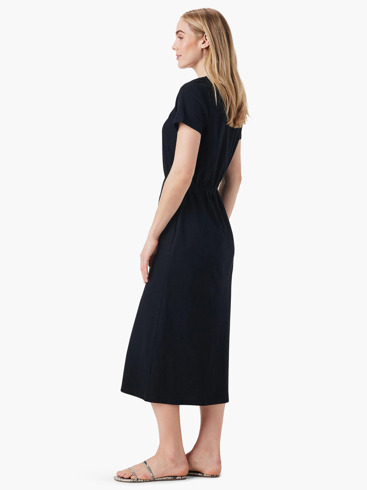 Black midi dress, short sleeves, side slits, cinched waist.  Shown on a model.