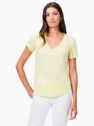 Pale yellow short sleeve V-neck tee, textured fabric, with shoulder gathers and a relaxed fit.