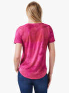 Pink short-sleeve V-neck tee.  Back view shows a mottled, faded pink and reddish-pink pattern.
