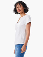 White short-sleeved tee with split neckline and small pocket.