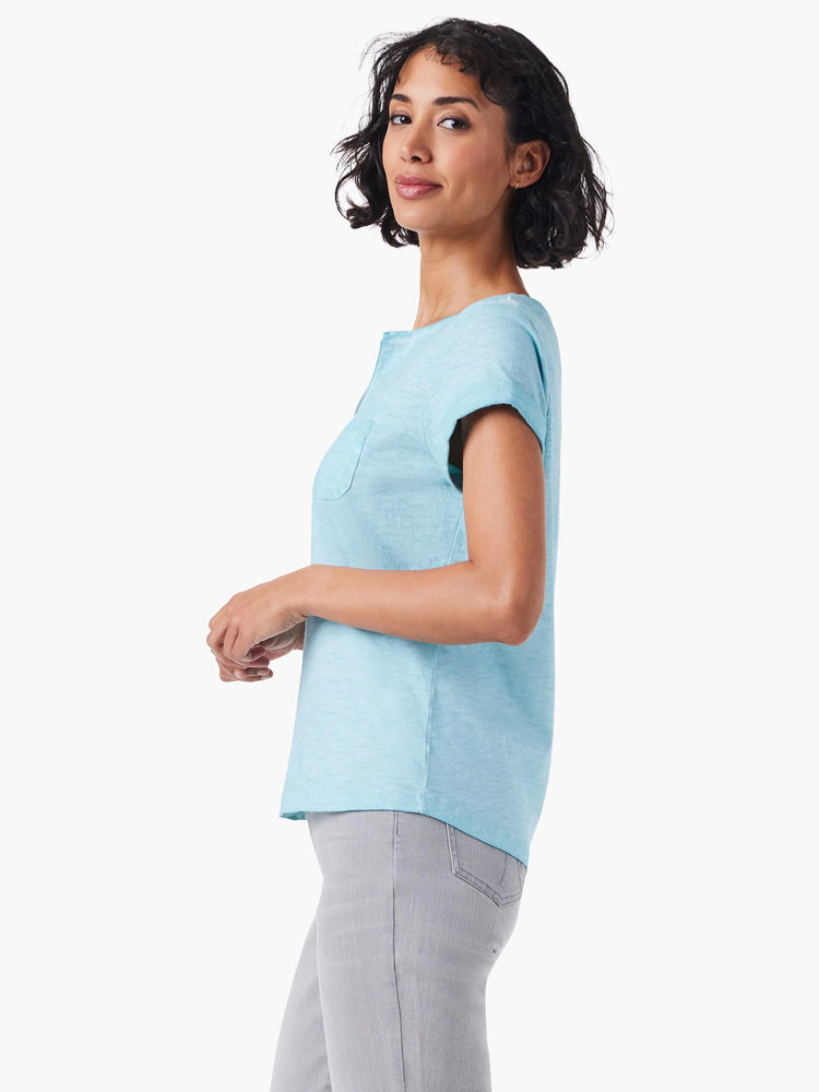 Light blue, short-sleeved tee with a split neck and small pocket.  Side profile view.