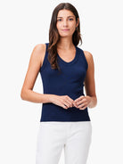 Navy blue, textured V-neck sleeveless top.