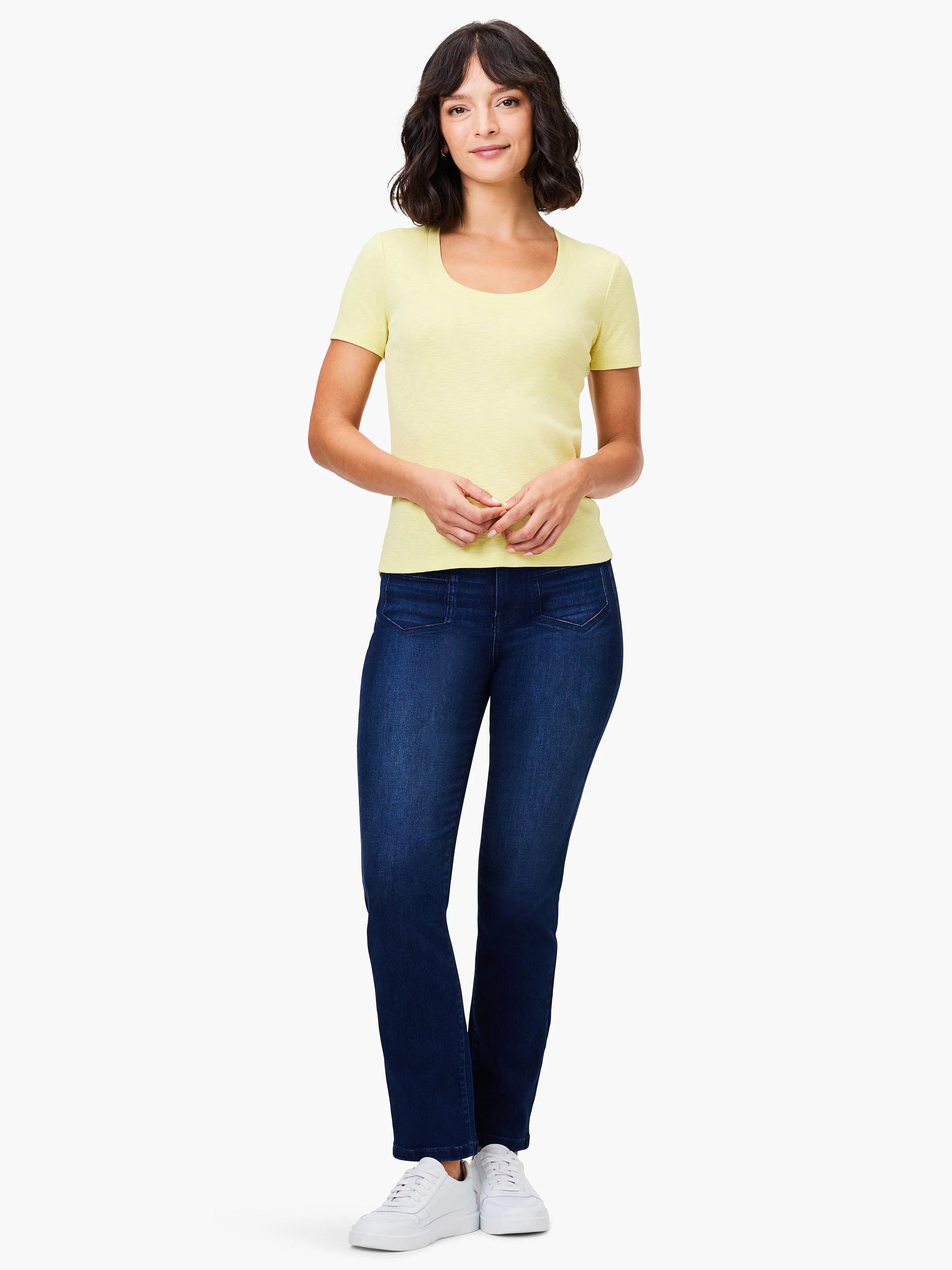 Pale yellow scoop-neck short-sleeve shirt; shown on model with dark wash jeans and white sneakers.