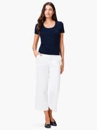 Navy blue scoop-neck short-sleeve shirt.