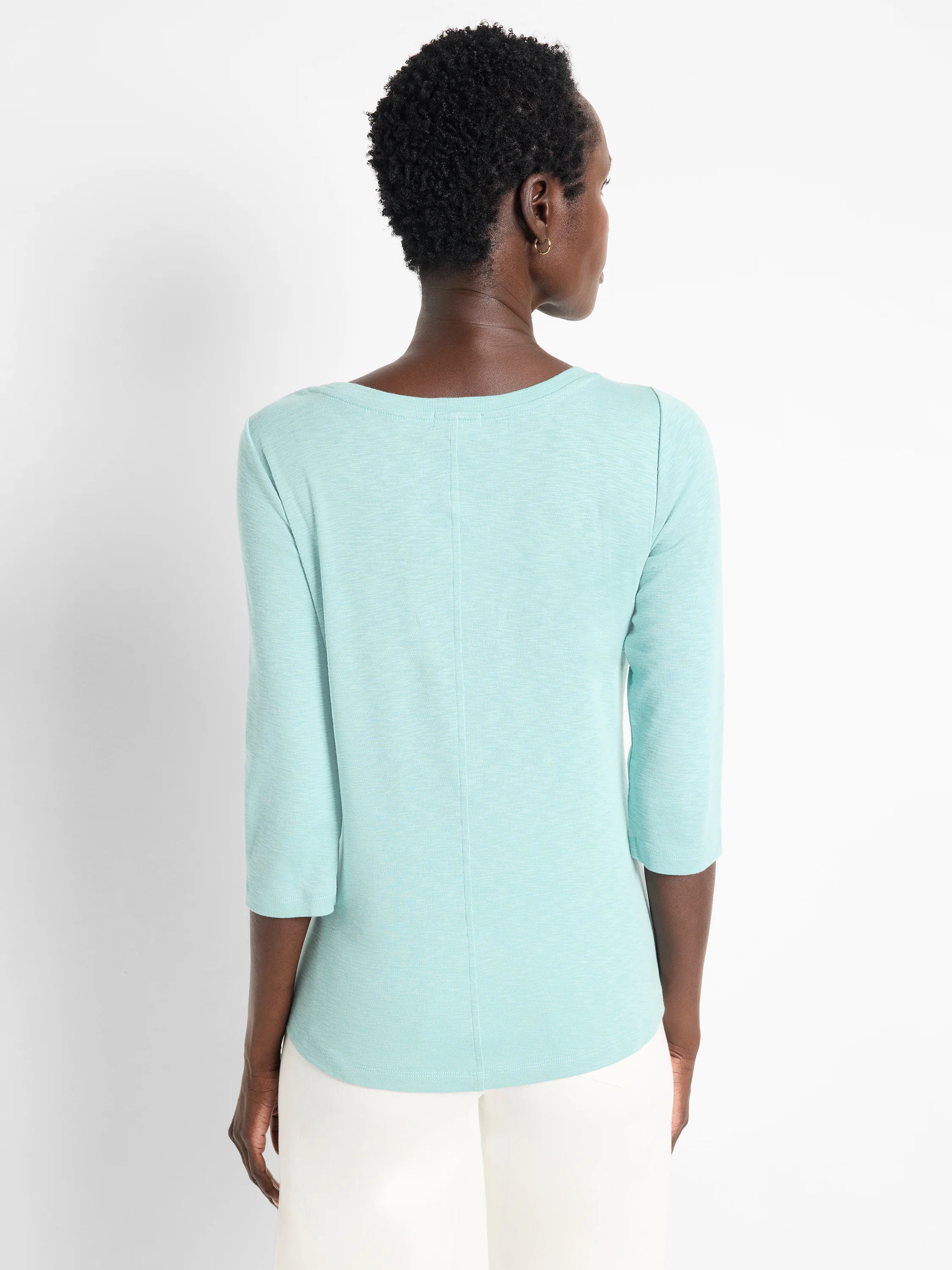 Aqua 3/4 sleeve boat tee, back view on model. Features heathered knit fabric, wide neckline, and vertical back seam.