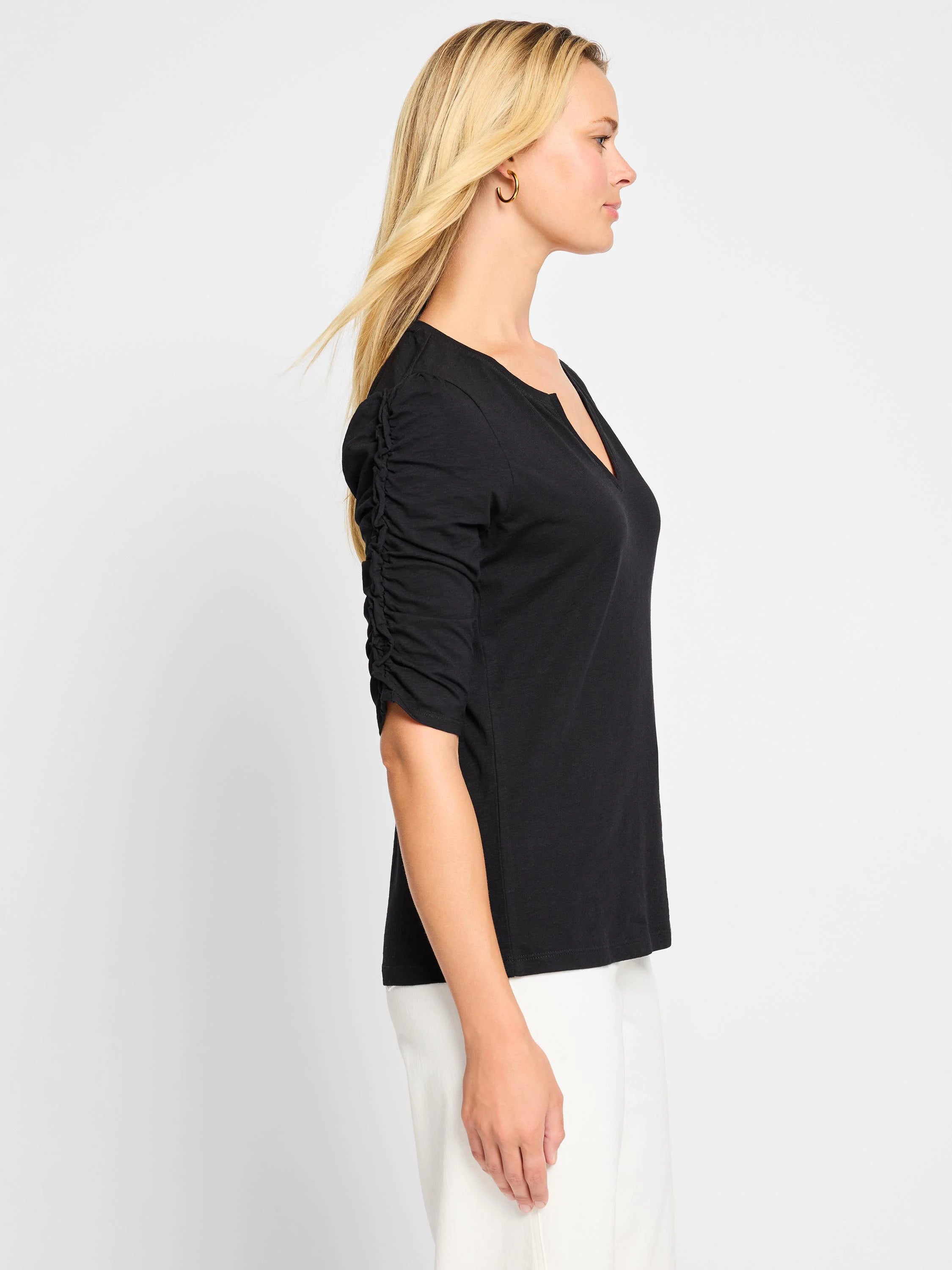 Black, elbow-length ruched sleeves, split neckline, 3/4 sleeve t-shirt.