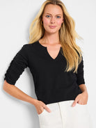 Black, 3/4 sleeve t-shirt. Split neckline, ruched sleeves.