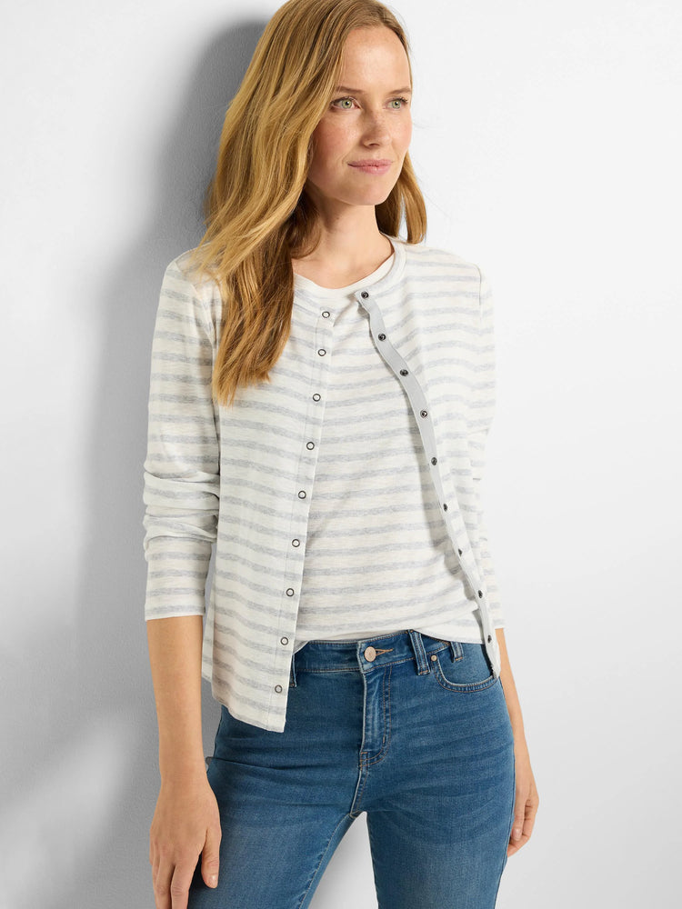 Off-white cardigan with thin gray stripes, long sleeves, and snap closures.