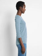 Boat tee with 3/4 sleeves, featuring light blue and navy horizontal stripes.