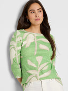 Light green 3/4 sleeve boat neck shirt with off-white fern pattern.
