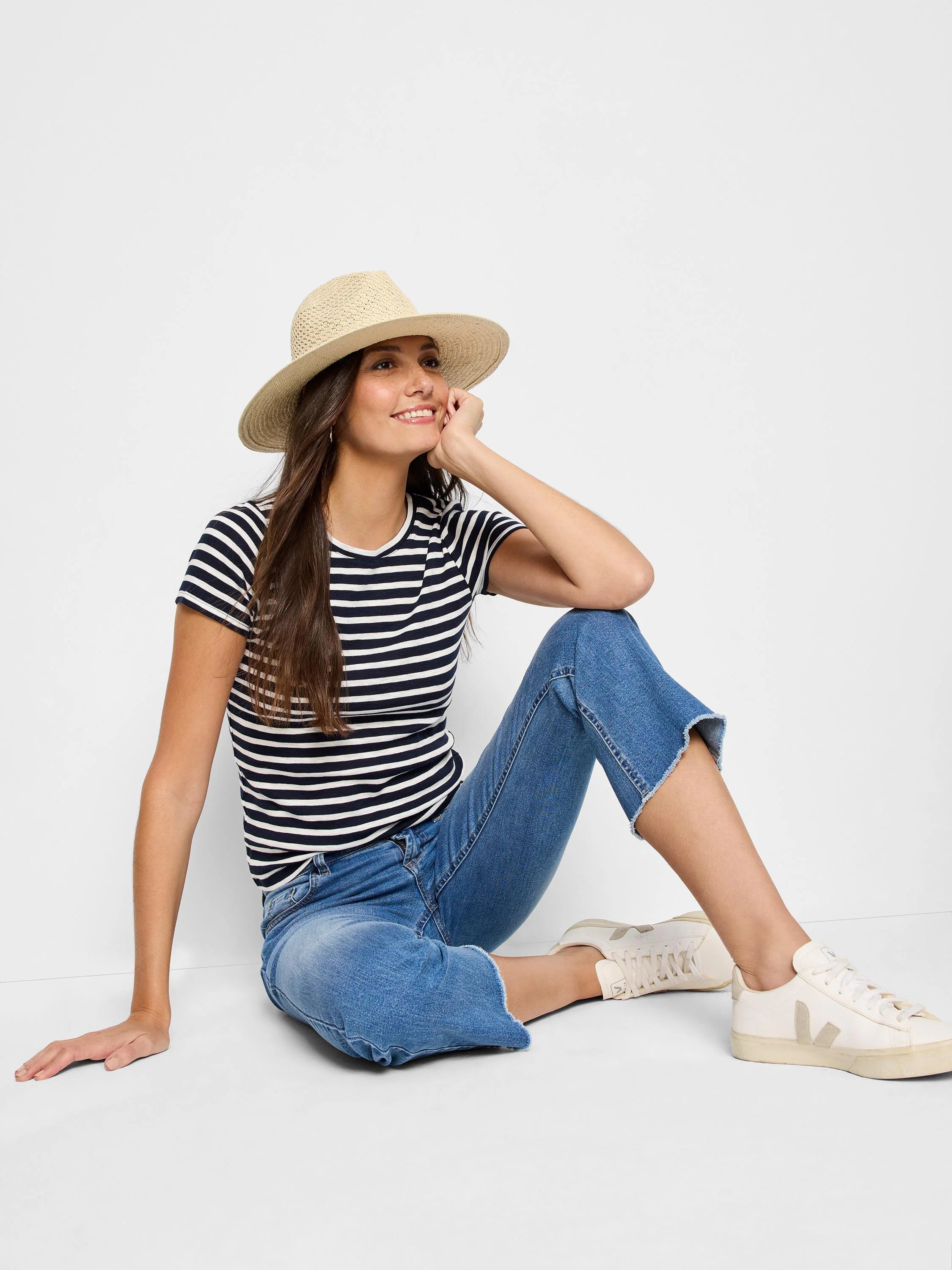 Navy blue and white striped short-sleeve shirt with a crew neck.