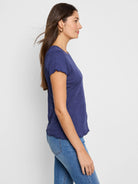 Dark blue, short-sleeved knit t-shirt.  Slight texture, scalloped hem and sleeves.