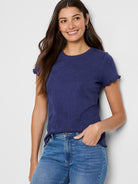 Navy blue lace-knit t-shirt with short, scalloped sleeves.  Floral textured pattern.