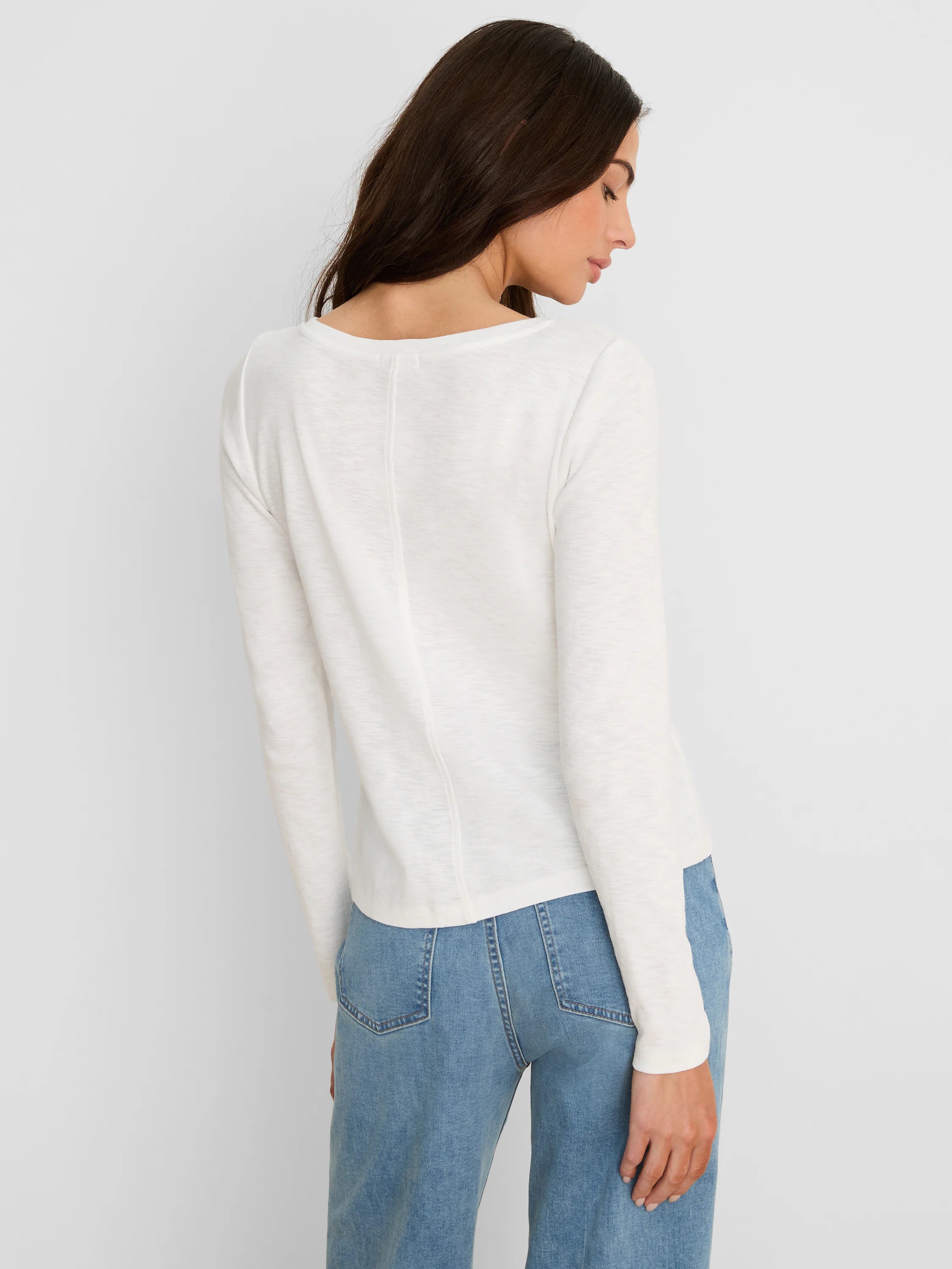 Off-white, ribbed long-sleeve boat tee with a distinct center back seam detail.