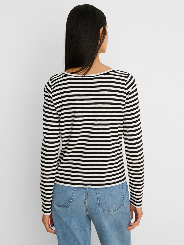 Long-sleeve boat neck tee with black & white horizontal stripes. Ribbed fabric, shown from the back.