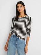 Black & white striped long-sleeve boat neck tee with ribbed fabric.