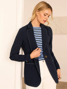 Light blue and dark blue horizontally striped boat neck tee with 3/4 sleeves.