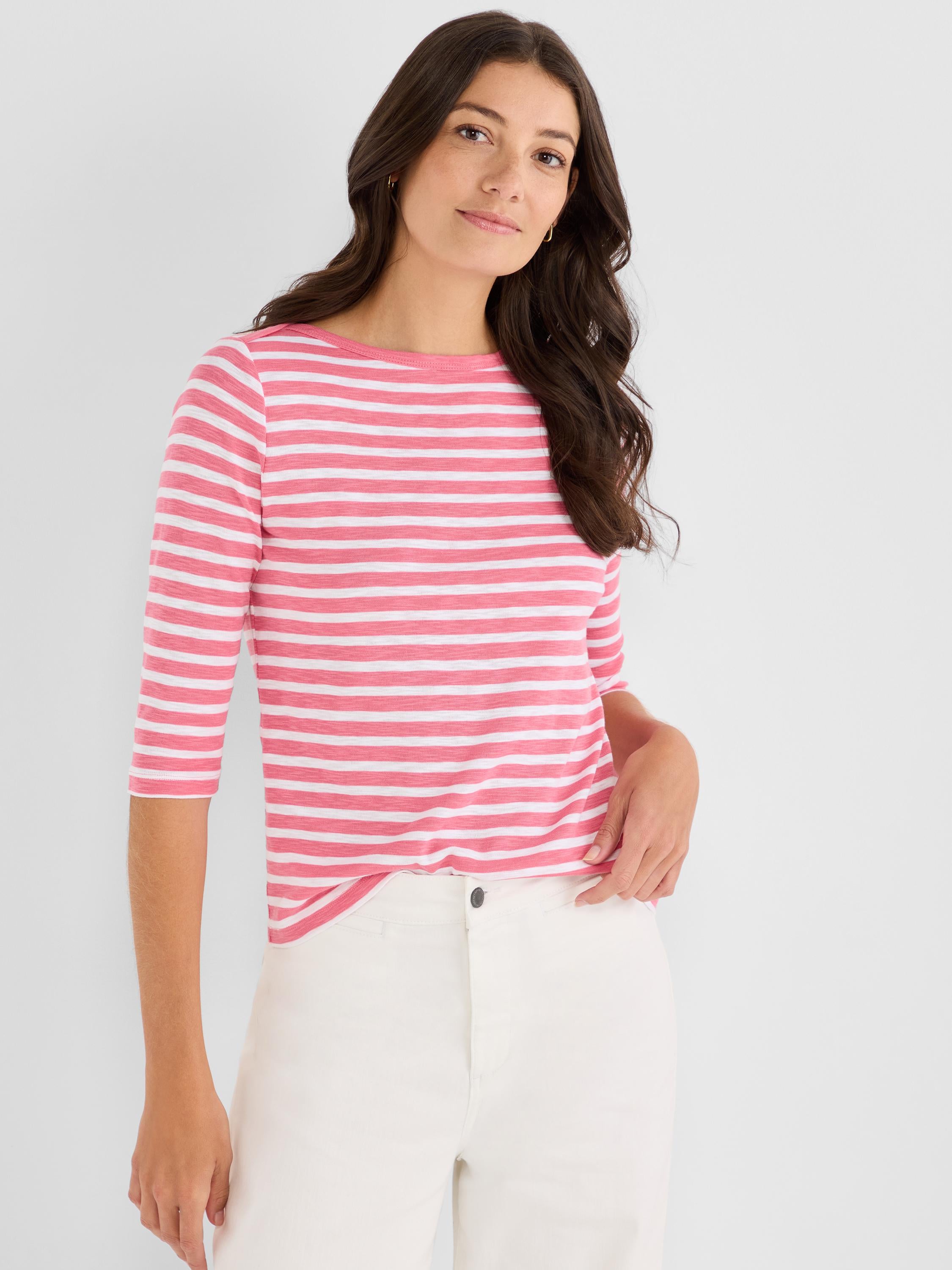 Pink and white striped tee with a relaxed fit, three-quarter sleeves, and a flattering bateau neckline.