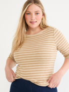 Fitted knit top in beige and tan horizontal stripes featuring a boat neck and elbow-length sleeves.